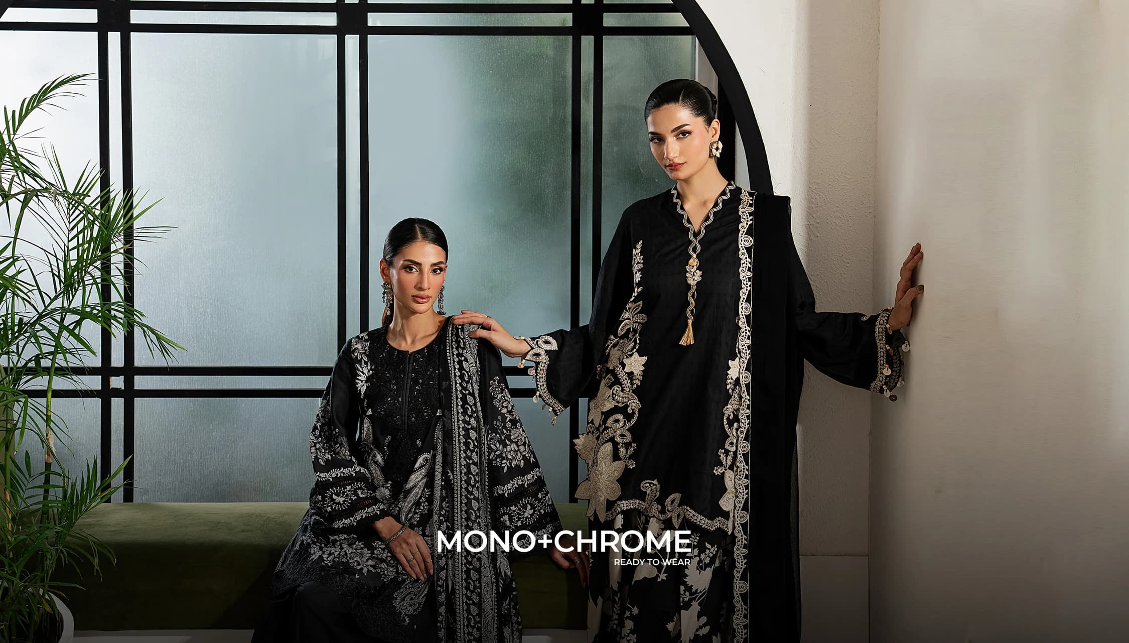 Mono+Chrome — two models in black and silver embellished ready-to-wear