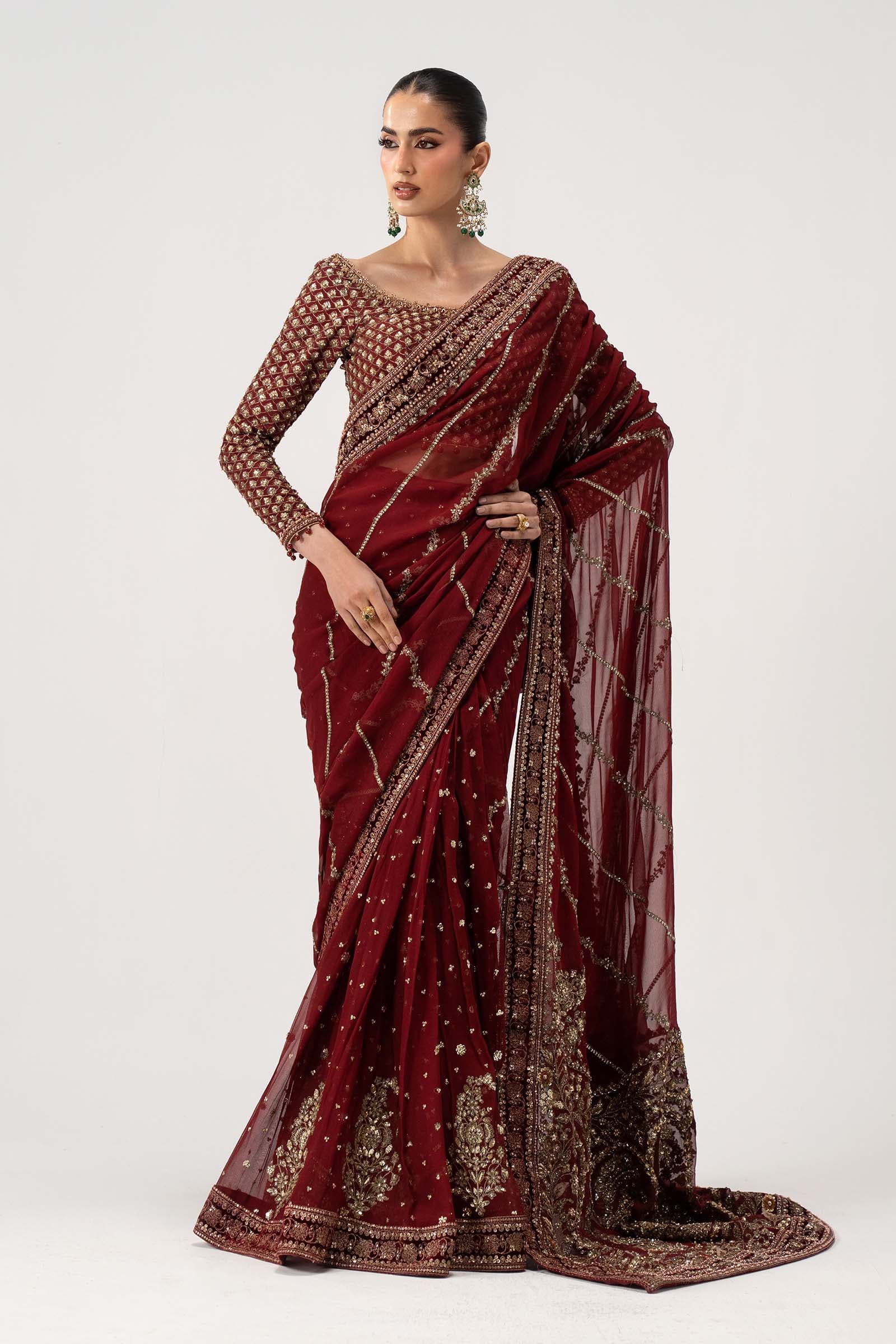 Model in a wine couture saree with an embroidered blouse