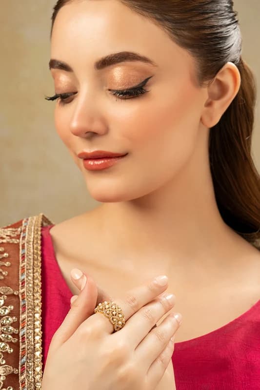 Gold pavé band worn on the ring finger